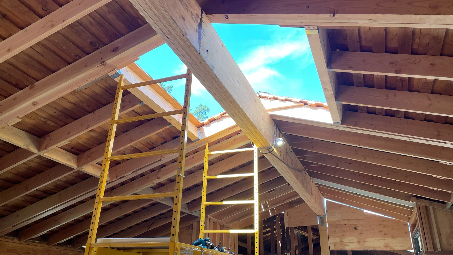 Roof framing from inside, skylight cut